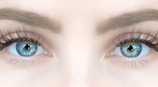 Close-up of striking blue eyes and eyelashes.