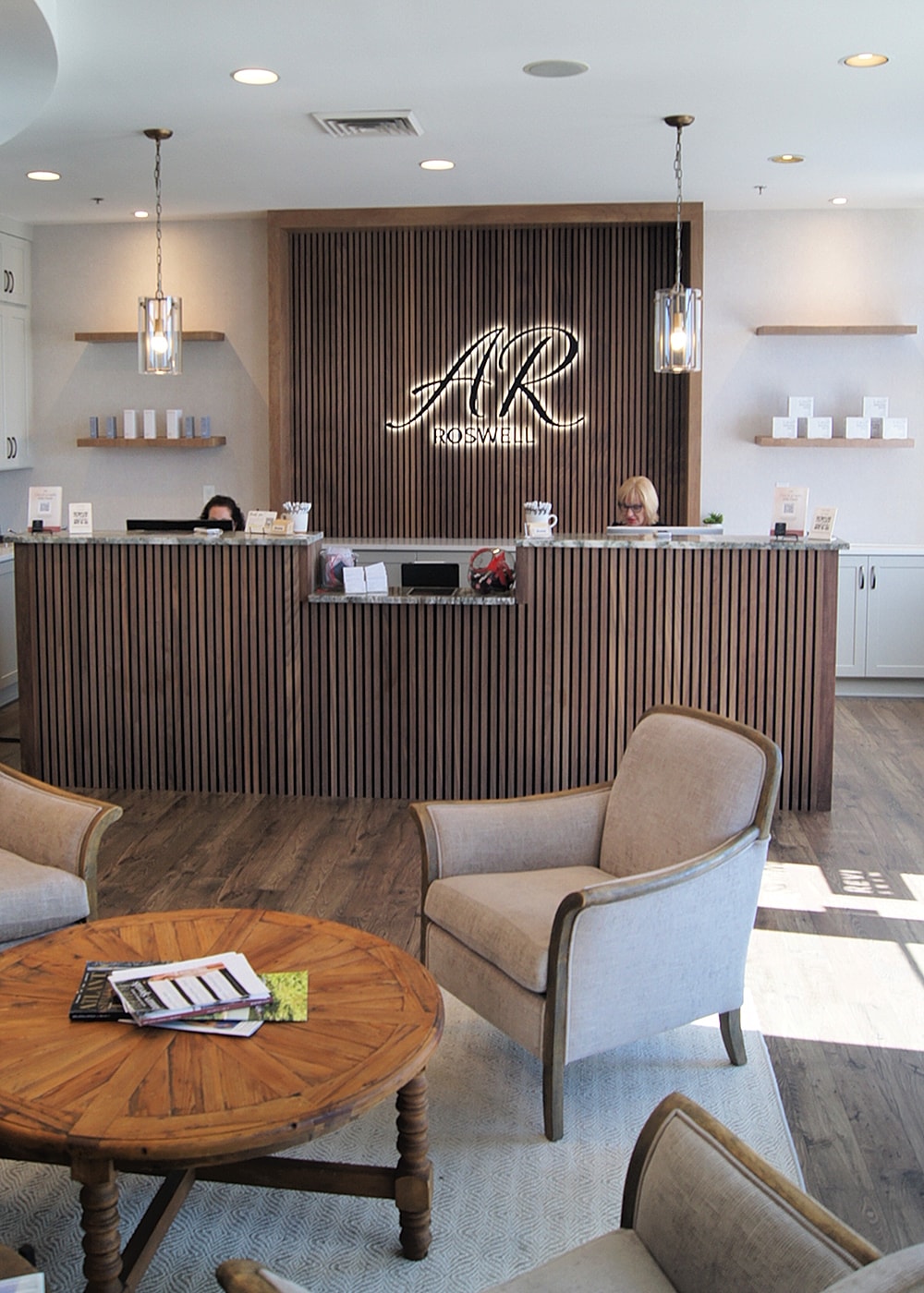 Clean and modern reception area with seating.