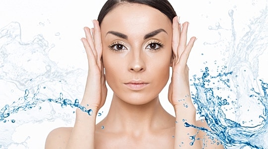 Woman with healthy skin after receiving hydrafacial treatment