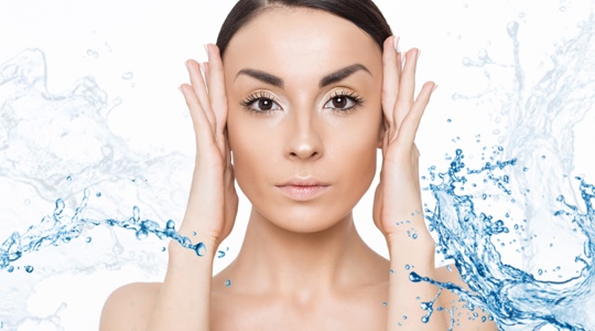 Woman with healthy skin after receiving hydrafacial treatment