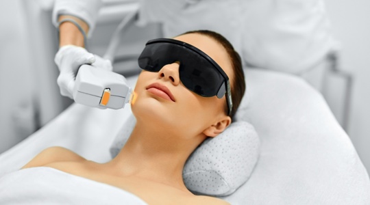 Woman receiving ultherapy treatment at a medspa